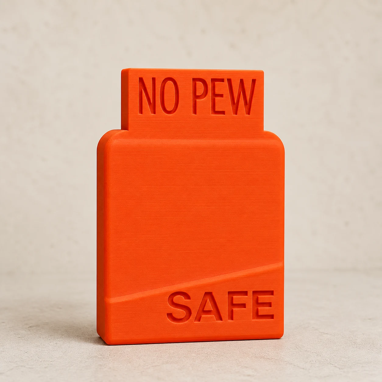 AR-10 safety flag photographed on a neutral studio background